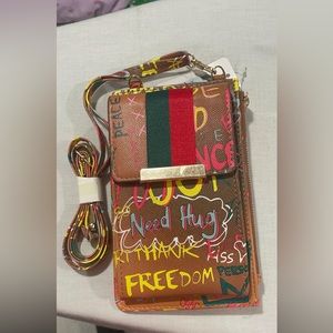 Crossbody Graffitti bag; two compartment & multiple card slots inside. $25 each